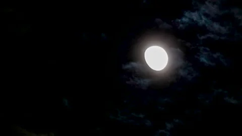 Large Full Moon Crossing Night Sky 4K Timelapse Stock Footage 320353870