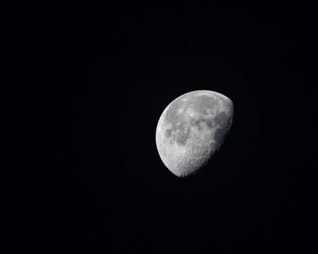A large, full moon is the main focus of this image Stock Photos