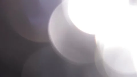 Large full-screen sparkling white bokeh background on black Видео 318675537