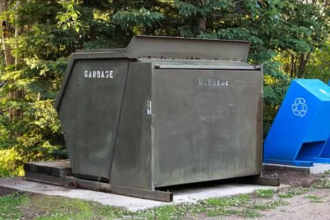 A large garbage bin at a campground Stock Photos