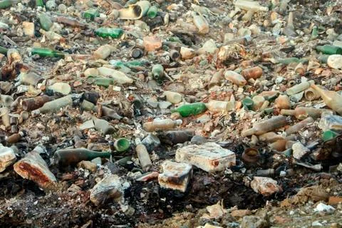 Large garbage dump waste with broken bottles Stock Photos
