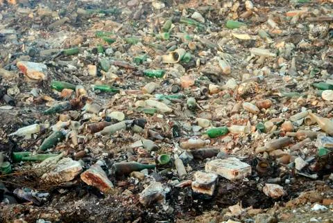 Large garbage dump waste with broken bottles Stock Photos