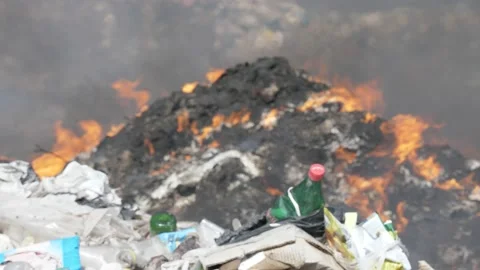 Large garbage landfill, burning trash with loth of polluting smoke. Stock Footage 170696141