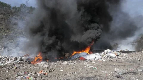 Large garbage landfill, burning trash with loth of polluting smoke. Stock Footage 170696231
