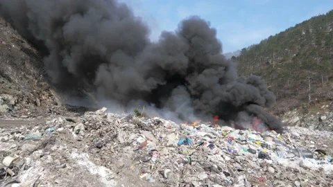 Large garbage landfill, burning trash with loth of polluting smoke. Stock Footage 170696732