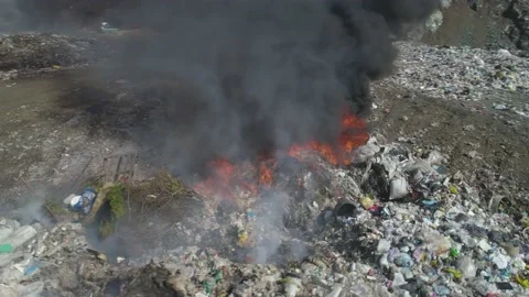 Large garbage landfill, burning trash with loth of polluting smoke Stock Footage 170697341