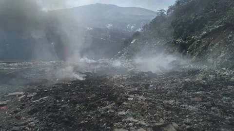 Large garbage landfill, burning trash with loth of polluting smoke Stock Footage 170697608