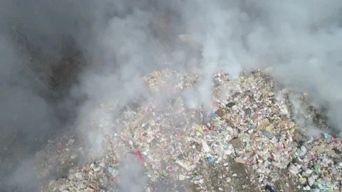 Large garbage landfill, burning trash with loth of polluting smoke Stock Footage 170698387
