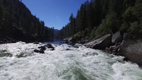 Large Gear Boat Comes Down Whitewater Rapids EDITORIAL Stockbeeldmateriaal 77368001