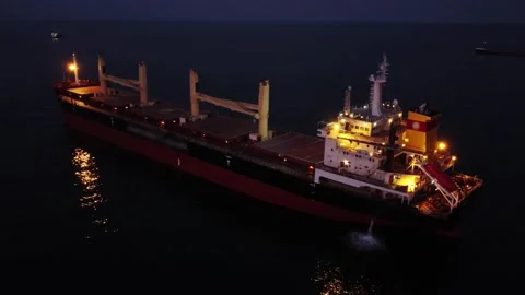 Large general cargo ship tanker bulk carrier, aerial view at night. Stock Footage 203881519