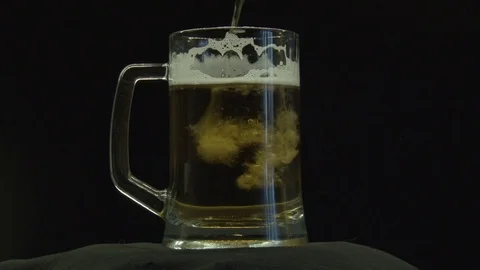 A large glass of cold and refreshing beer Stock Footage 75186011