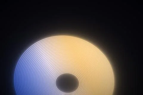 A large glowing ring made of closely spaced curved lines sits centered on a.. Stock Illustration