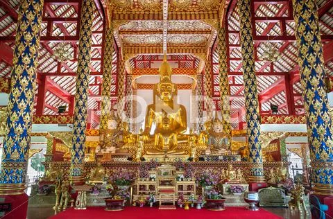 Large golden buddha statues on the altar at Wat Suan Dok, Chiang Mai, Thailand Stock Photos
