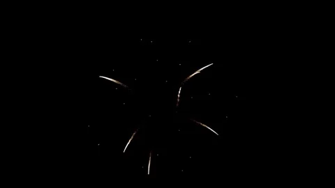 Large golden firework explosion with red sparks at night Video stock 329673792