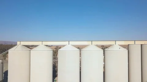 Large grain silos horizontal aerial shot Stock-Footage 79806341