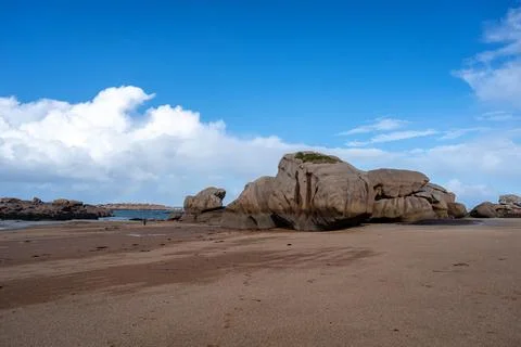 Large granite formations on sandy shore in Tregastel, Brittany, France 写真素材