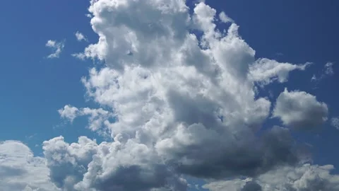 Large gray cloud in blue sky flies into air. No buildings. Full HD Time Lapse Stock Footage 157827479