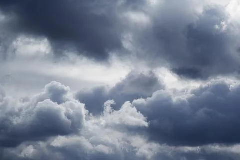 Large gray clouds in the sky close-up Stock Photos