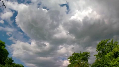 A large gray rain cloud moves before it rains ,Timelaps. Stock Footage