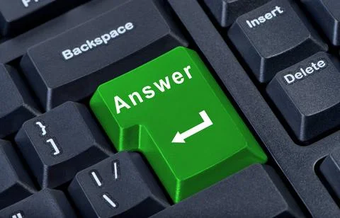 Large green computer keyboard button with the word answer and arrow. Large... Stock Photos