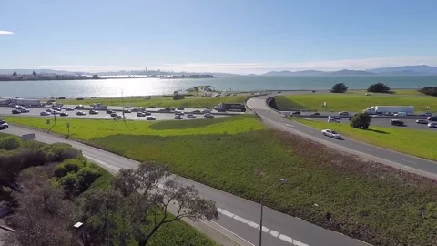 A large green field with trees in the background Stock Footage 156341510