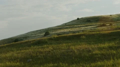 Large Green Hill with Clouds in Background Stock Footage 53232600