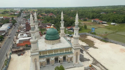 Large Green Mosque Next To Main Highway Madura Island Indonesia Drone Track Stock Footage 337978888