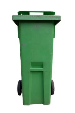 Large green plastic trash bin. Old green recycling container waste die-cut. Foto stock