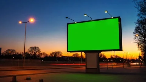 Large Green Screen Billboard at Dusk Video stock 313114577
