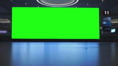 Large green screen panel in airport with blurred figures of travelers Video stock 291337707