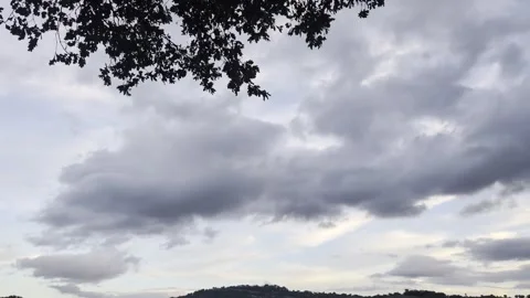 Large grey and white clouds move slowly Stock Footage 347388293