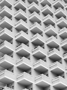  Large grey apartment development with geometric repeating balconies Large... Stock Photos