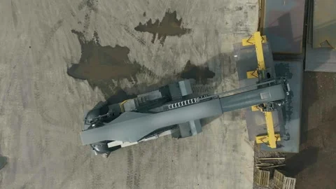 Large Grey Steel Component on an Industrial Yard, Gantry Crane, Aerial Top Down Stock Footage 341528442