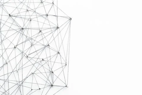 A large grid of pins connected with string. Communication, network concept Stock Photos