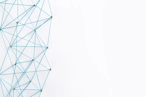 A large grid of pins connected with string. Communication, technology, networ Stock Photos