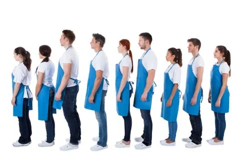 Large group of cleaners standing in a queue Stock Photos