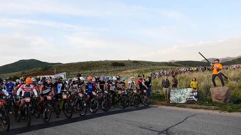 A large group of competitors at the start of Mountain Bike Race. Stock Footage 106790459