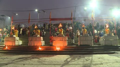Large group of devotees assembled for evening Arthi at Saryu Ghat Stock Photos