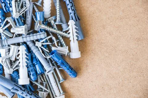 Large group of different wall plugs and screws Stock Photos