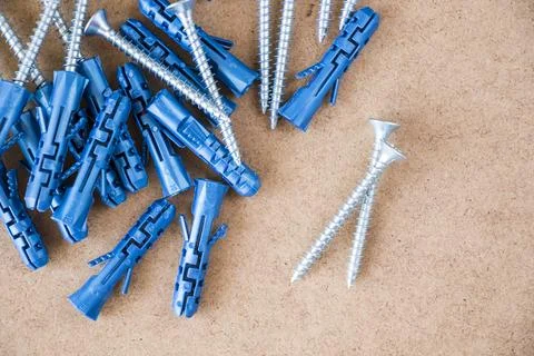 Large group of different wall plugs and screws Stock Photos