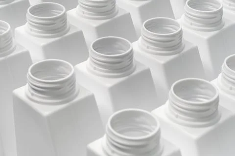 Large group of empty white plastic bottles Stock Photos