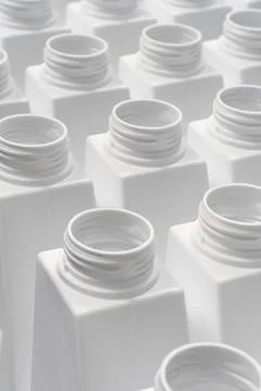 Large group of empty white plastic bottles Stock Photos