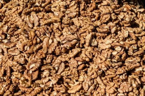 Large group of fresh walnut kernels sold at a spice food market, organic food Foto stock