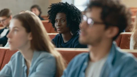 Large Group of Multi Ethnic Students Listening to a Lecture in the Classroom.  Stock Footage 87967310