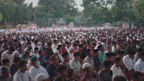 Large group Muslim prayer Eid celebration in Indonesia Islamic worship gathering Видео 331196828
