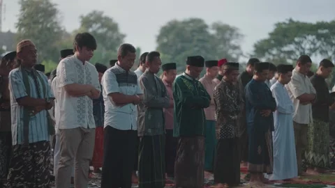 Large group Muslim prayer Eid celebration in Indonesia Islamic worship gathering Видео 331202146