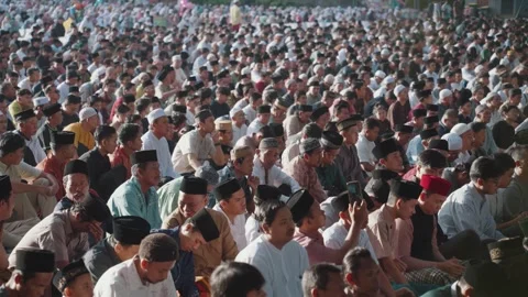 Large group Muslim prayer Eid celebration in Indonesia Islamic worship gathering Видео 331209394