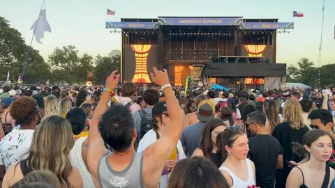 Large group of people dance at a outdoor music festival concert Stock Footage 255478676