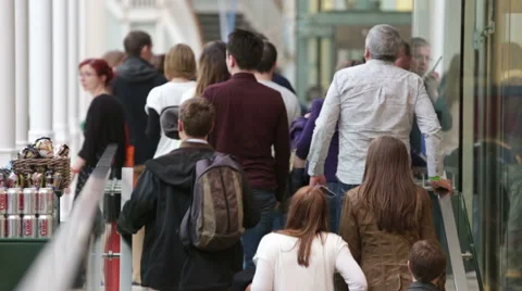 Large group of people entering a modern museum smiling Stock Footage 58627702