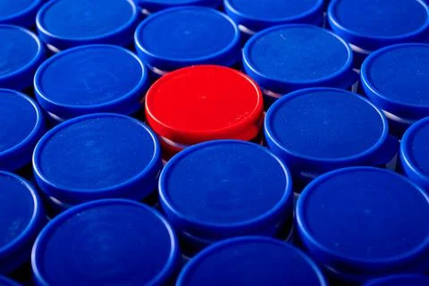 Large group of plastic bottles lined up on a table. Stock Photos